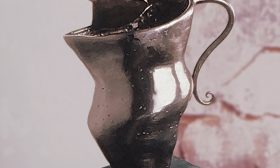 small fish on jug